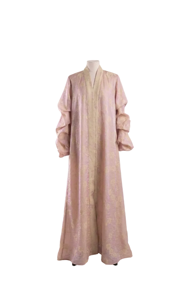 Long, light pink kimono with a subtle pattern with puffed sleeves and yellow print